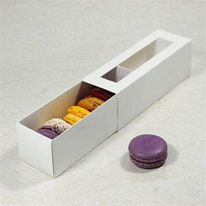 White macaron box with a window, containing colorful macarons, perfect for gifting or presentation.